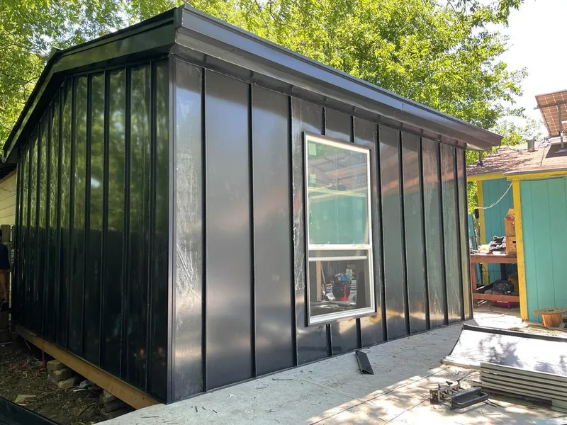 Black standing seam metal wall panels for Metal Roof Installation in Watervliet